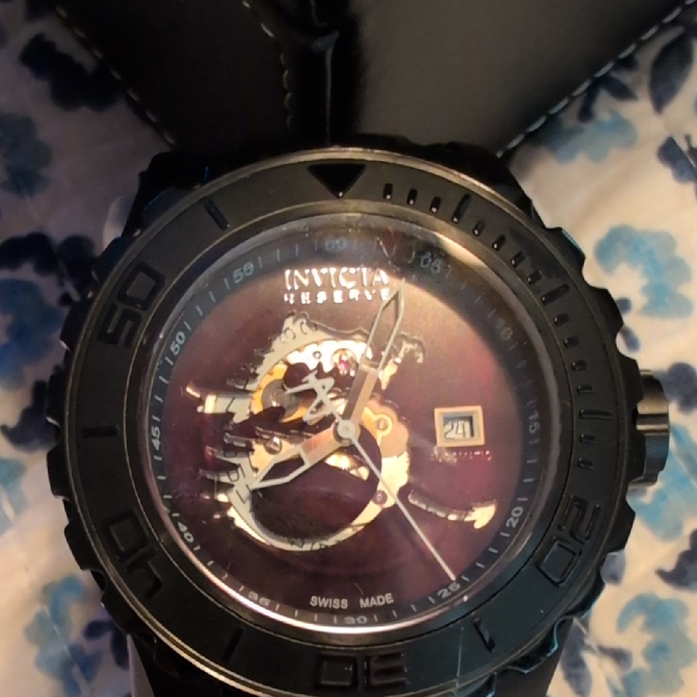 Invicta Black and Gold Skeleton Dial Watch